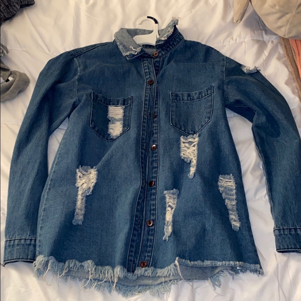 Distressed jean jacket